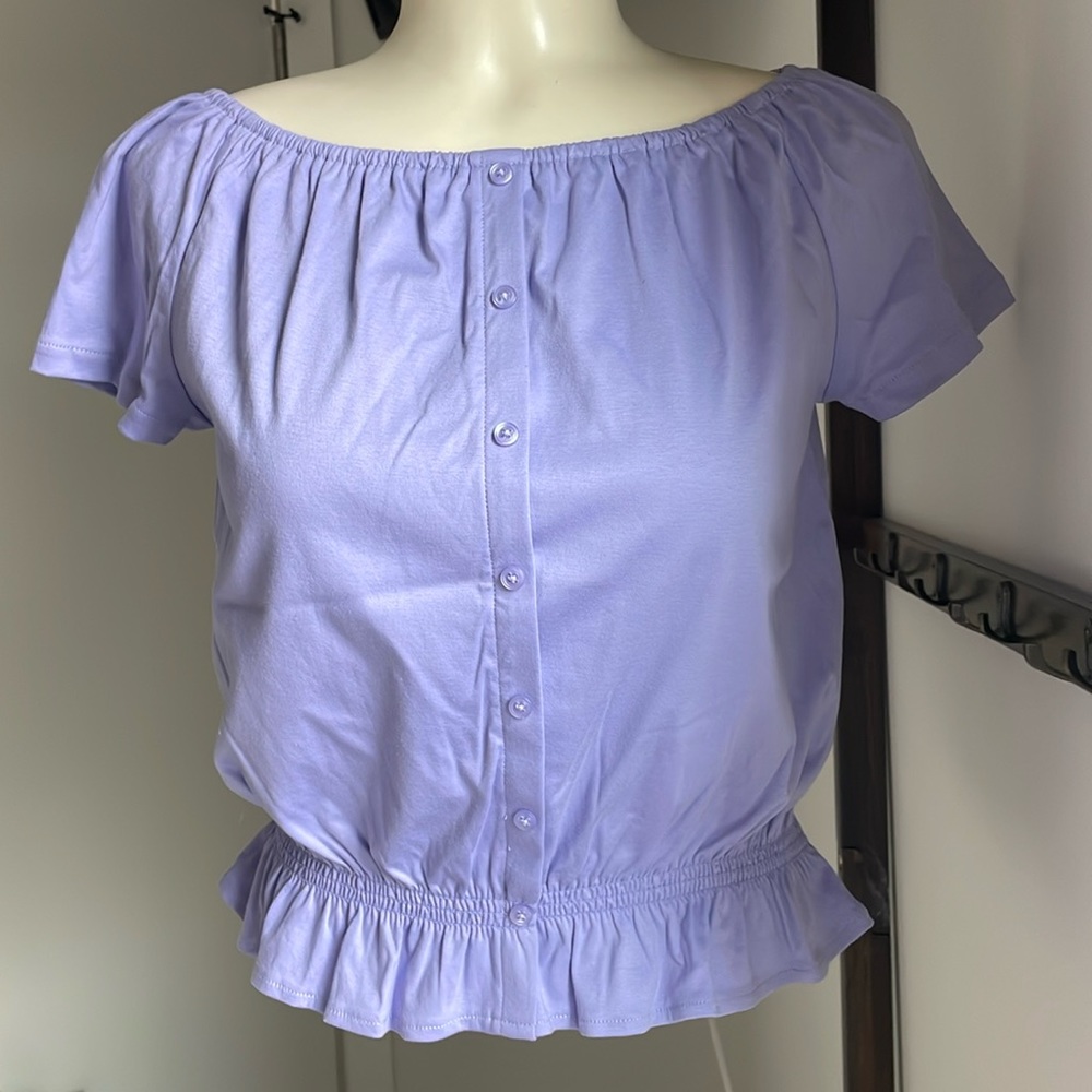 Pretty lilac summer top with matching Faux buttons and stretch waist .